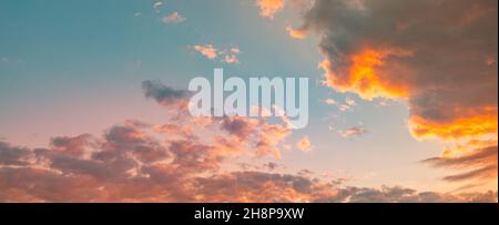 Wide angle view of sunset sunrise sky. Colorful sunset twilight sky, bright sun. Nature sky backgrounds. Idyllic relaxing tranquil freedom concept Stock Photo
