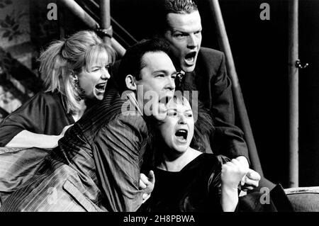 ROAD by Jim Cartwright design: Paul Brown lighting: Christopher Toulmin director: Simon Curtis  l-r: Jane Horrocks (Louise / Clare / Valerie), Ewan Stewart (Brother / Brink), Mossie Smith (Carol / Chantal), Iain Glen (Eddie / Skin)  Royal Court Theatre, London SW1 2 6/01/1987 Stock Photo