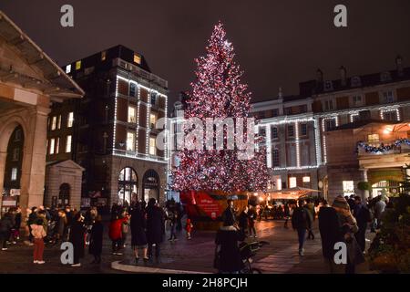 Christmas tree in Covent Garden at night. London, UK. 30th November 2021.