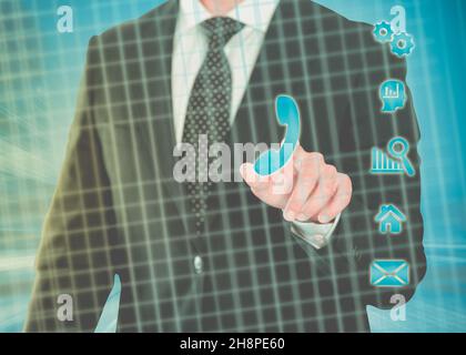 Businessman pressing virtual button phone call Stock Photo