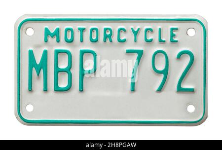 Green and White Metal Motorcycle License Plate Cut Out. Stock Photo