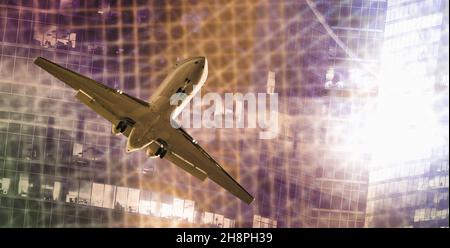 Plane flying on skyscrapers and binary key background Stock Photo