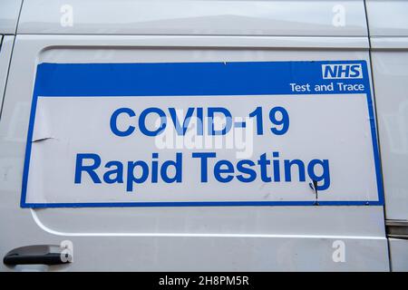 Chesham, Buckinghamshire, UK. 1st December, 2021. Free Covid-19 lateral flow tests were being given out by Buckinghamshire Council to shoppers today in Chesham on market day. The Government are encouraging shoppers to take Covid-19 lateral flow tests before they do their Christmas shopping in attempt to try to keep the rising number of positive Covid-19 cases down. Credit: Maureen McLean/Alamy Live News Stock Photo