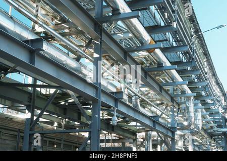 Tracing of pipelines and communications on metal structures in industry. Industrial Zone Stock Photo