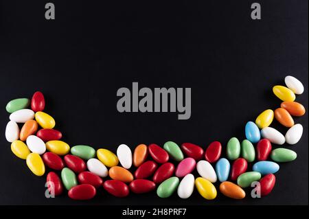 Colorful Easter eggs on a black surface Stock Photo