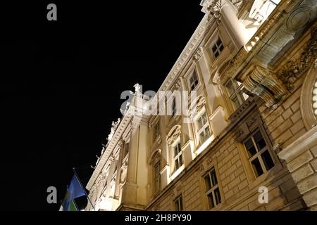 Trieste  Italy - January 13, 2020: view of the Lloyd Triestino building in Unità d'Italia square in the night. Stock Photo