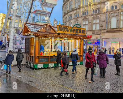 SHEFFIELD, UK, 27th NOVEMBER 2021: People enjoying shopping at a Christmas market Stock Photo