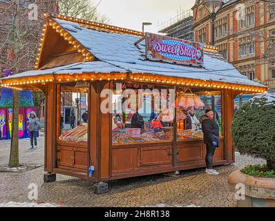SHEFFIELD, UK, 27th NOVEMBER 2021: People enjoying shopping at a Christmas market Stock Photo