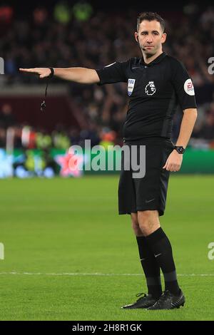 London, UK. 01st Dec, 2021. Referee Chris Kavanagh looks on during the game. Premier League match, West Ham Utd v Brighton & Hove Albion at the London Stadium, Queen Elizabeth Olympic Park in London on Wednesday 1st December 2021. this image may only be used for Editorial purposes. Editorial use only, license required for commercial use. No use in betting, games or a single club/league/player publications. pic by Steffan Bowen/Andrew Orchard sports photography/Alamy Live news Credit: Andrew Orchard sports photography/Alamy Live News