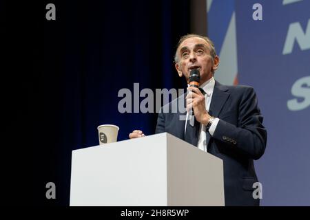 Eric Zemmour seen on stage during a conference before the official announcement of his candidacy for the presidential election.The extreme right-wing polemicist Eric Zemmour announced on December 01, 2021 that he is officially a candidate for the French presidential election. To validate his candidacy definitively he will have to find 500 sponsorship of representatives to deposit in front of the constitutional council. The French presidential election is a majority vote with two rounds whose dates are fixed to April 10 and 24, 2022. Stock Photo