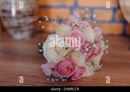 beautiful delicate bridal bouquet on the table. floral wedding theme Stock Photo