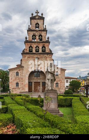 Church of the city of Cangas de Onis in Asturias and statue of King Don Pelayo.  Stock Photo