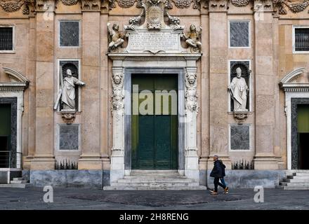 Façade of the Church of Jesus (Chiesa del Gesù, 16th century) in the historic centre of Genoa with people in a sunny day, Liguria, Italy Stock Photo