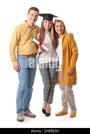 Happy female graduation student with her parents on white background Stock Photo