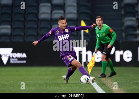 Perth Glory forward Dane Ingham (23) keeps the ball in Stock Photo