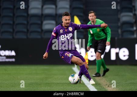 Perth Glory forward Dane Ingham (23) keeps the ball in Stock Photo