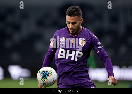 Perth Glory forward Dane Ingham (23) watches the ball Stock Photo