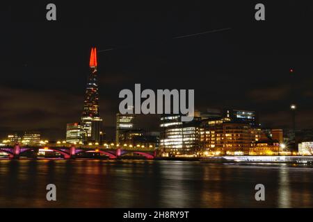 London, UK, 1st Dec, 2021. The Shard's Christmas light display is switched on this evening, being dedicated this year to the emergency services.  The light display will run every day in December. Credit: Eleventh Hour Photography/Alamy Live News Stock Photo