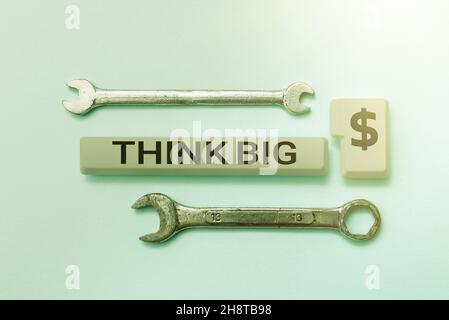 Sign displaying Think Big. Concept meaning To plan for something high value for ones self or for preparation Typing Program Functional Descriptions Stock Photo