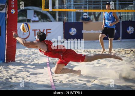 IZMIR, TURKEY - JULY 10, 2021: Russia (Komissarenko and Rukhmanov) vs Norway (Mol, M. and Sunde) Quarterfinal match of CEV U20 Beach Volleyball Europe Stock Photo