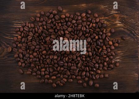 Coffee beans on an old rustic background Stock Photo