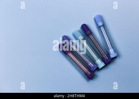 blue felt-tip pens of different shades on a light blue background. Stock Photo