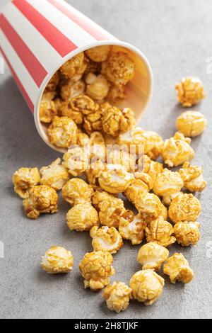 Sweet caramel popcorn in cup. Stock Photo