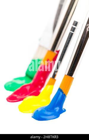 Colorful brushes painting on white paper Stock Photo