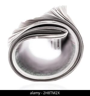 Rolled newspaper isolated on white background Stock Photo