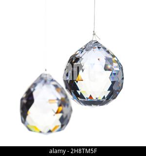 Two crystals on a thin thread Stock Photo