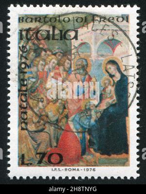ITALY - CIRCA 1976: stamp printed by Italy, shows Adoration of the Kings by Bartolo di Fredi, circa 1976 Stock Photo