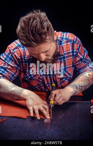 Artisan being keen on his buisness Stock Photo