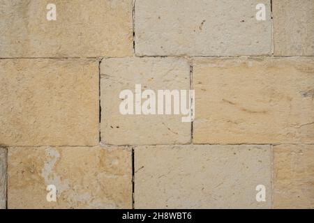 wall built with limestone blocks Stock Photo