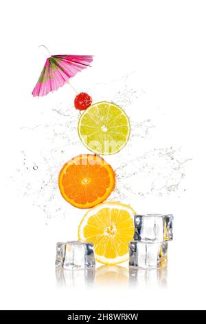 Stacked lemon, orange and lime with splashes of water and ice cubes on white background Stock Photo