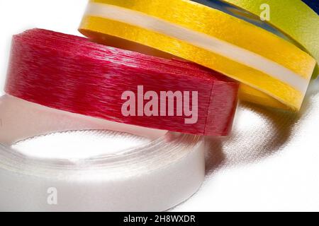 Multi-colored ribbons on a white background Stock Photo