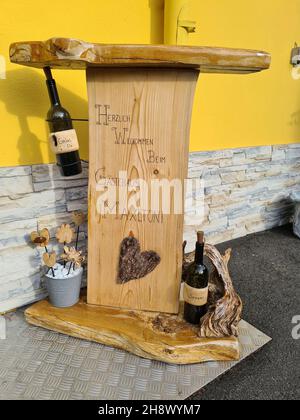 Kitzeck im Sausal, Austria - September 22, 2021: Wooden display with friendly welcome to the Maxltoni guest house in Styria. PR available Stock Photo