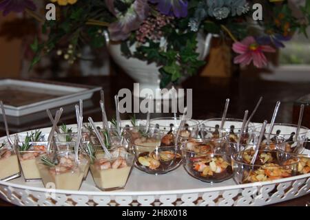 Mediterranean shrimp-based appetizer in glass jars on a tray Stock Photo