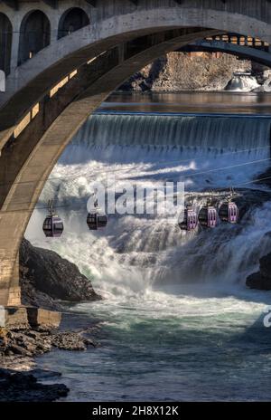 One of the attractions left from the worlds fair in 1974, the gondola skyride over Spokane Falls gives people a unique perspective of the crown Jewel Stock Photo