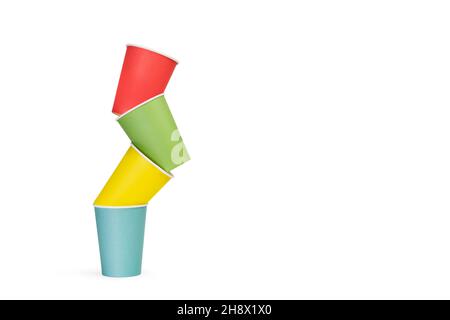 Colored paper cups in a heap on a white background Stock Photo