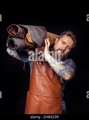Skinner producing leather workpiece Stock Photo