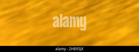 Golden yellow blurred gradient background. Mixed motion texture. Diagonal lines. Abstract defocused header. Wide screen wallpaper Stock Photo