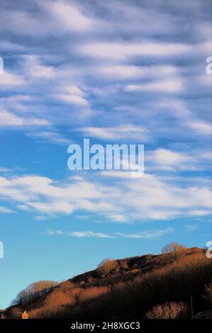 Portland. 2nd December 2021. UK Weather. A striking 'mackerel sky' over the Isle of Portland suggesting changeable weather. ' Mackerel sky, mackerel sky . never long wet, never long dry ' as the old rhyme reminds us. Credit: stuart fretwell/Alamy Live News Stock Photo