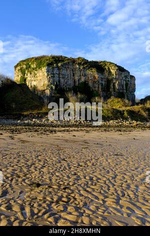 Remains of an eroding cliff face at Red Warf Bay, Anglesey, North Wales, UK Stock Photo