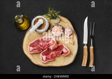 Overhead view of raw fresh lamb double loin chop ready for cooking Stock Photo