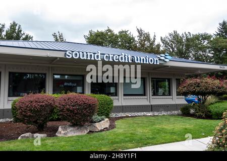 Redmond, WA USA - circa August 2021: Street view of the entrance to Sound Credit Union on an overcast day. Stock Photo