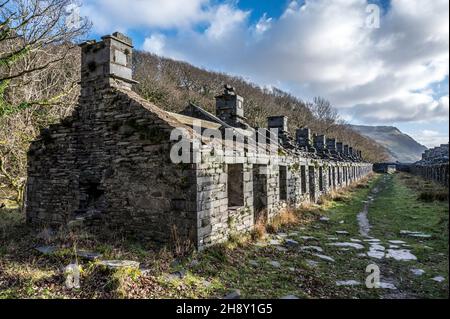 These are what used to be the Anglesey Barracks miners cottages at the abandoned Dinorwic slate quarry located above the Welsh village of Llanberis Stock Photo