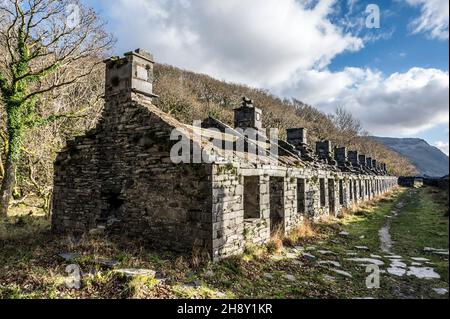 These are what used to be the Anglesey Barracks miners cottages at the abandoned Dinorwic slate quarry located above the Welsh village of Llanberis Stock Photo