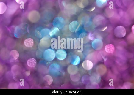 abstract colorful defocused circular facula,abstract background. Blue and purple bokeh lights. Beautiful blurred background. round sequins, close-up Stock Photo