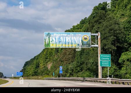 Bruceton Mills, West Virginia - Sept. 7, 2021: Welcome to West Virginia Wild and Wonderful sign is at the border with Maryland on Route 68. Stock Photo