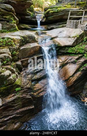 Sabbaday Falls waterfall in the White Mountain National Forest in New Hampshire, USA. The falls are a picturesque series of cascades in a narrow flume Stock Photo